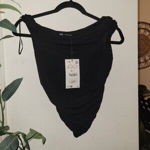A symmetrical crop top